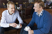 Hypnosis Downloads founders Roger Elliott and Mark Tyrrell enjoying a coffee in The Chocolate Shop, Oban.